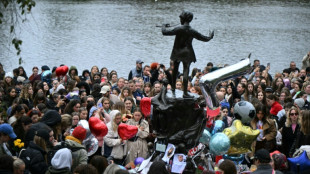 Fans gather to mourn Liam Payne's death at UK and other vigils