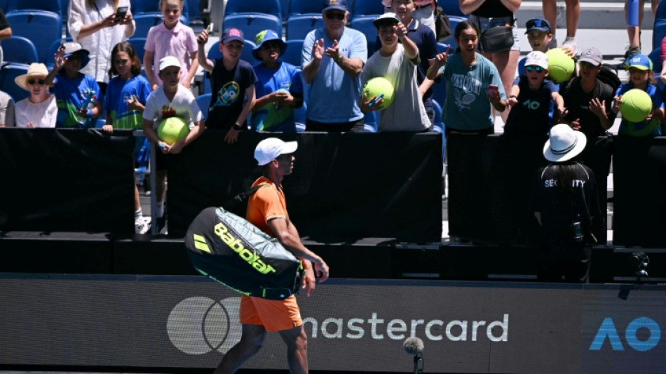 Auger-Aliassime retires from Melbourne first round with cramp