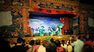 Taiwan singers won't let curtain fall on Hakka opera