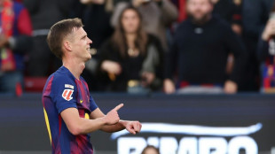 Olmo double helps Barca take Liga lead with Alaves win