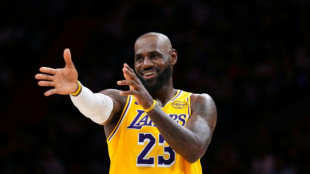 James ties NBA record for most regular-season games in latest milestone