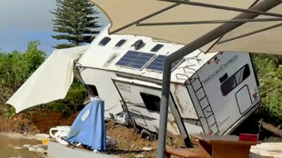 Workers dig for the missing in New Zealand landslide