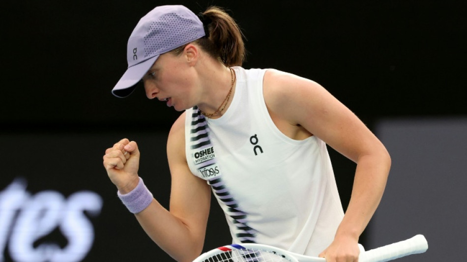 Swiatek survives scare to make Australian Open second round 