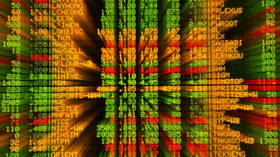 Stocks diverge, dollar slips before tech earnings, Fed decision