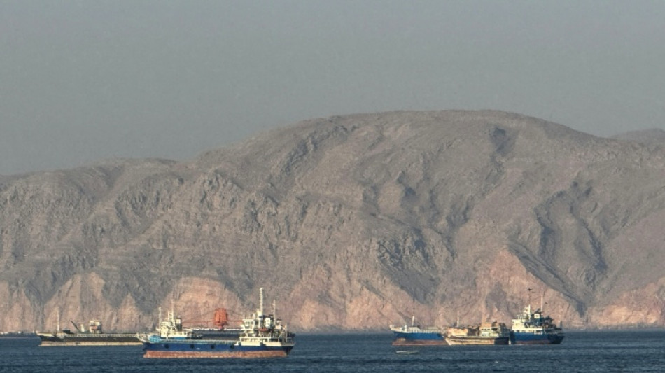 Oil drops, stocks hit records on hopes of Hormuz opening