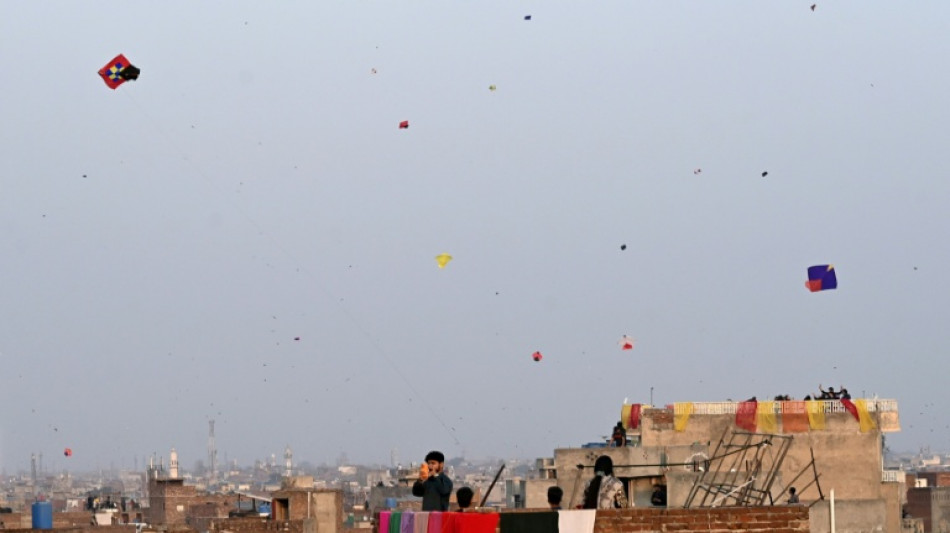 Colour and caution as banned kite-flying festival returns to Pakistan