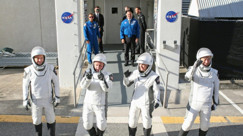SpaceX Crew Dragon docks with International Space Station