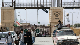 Pakistanis at remote border describe scramble to leave Iran
