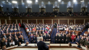 Ovation, pancarte et poign&eacute;e de main: cinq moments marquants du discours de Trump