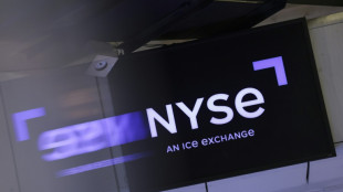Wall Street termine en ordre dispersé, record du Dow Jones