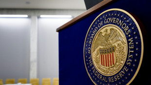 Stock markets downbeat on eve of Fed rate call