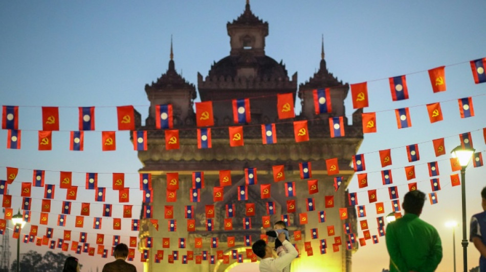 Please don't rush: slow changes in Laos 50 years after communist victory