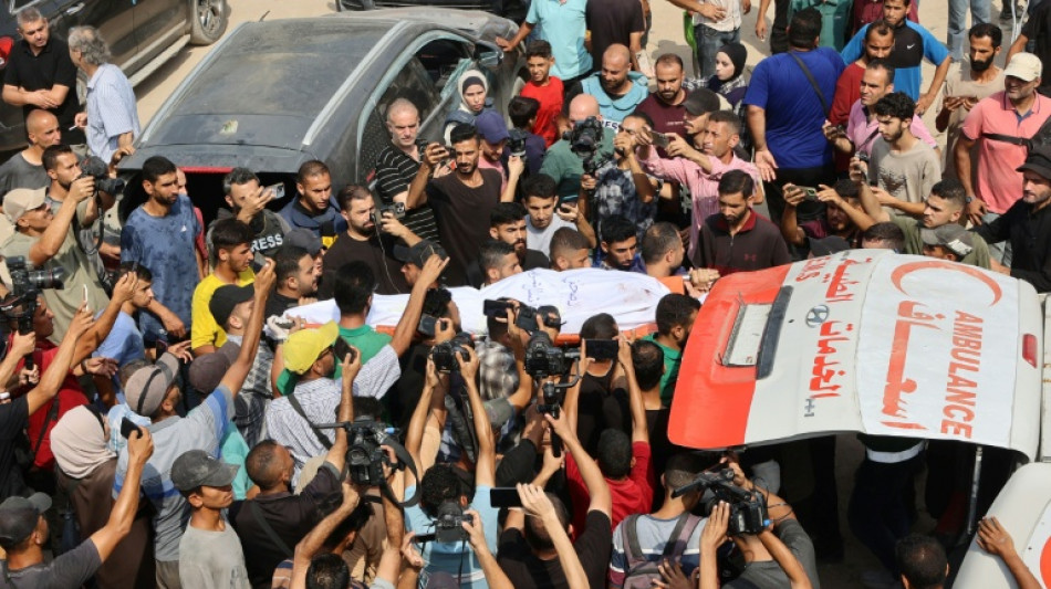 Mourners gather in Gaza for funeral of Al Jazeera staff killed by Israel