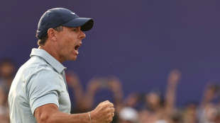 McIlroy loses playoff but clinches seventh Race to Dubai title