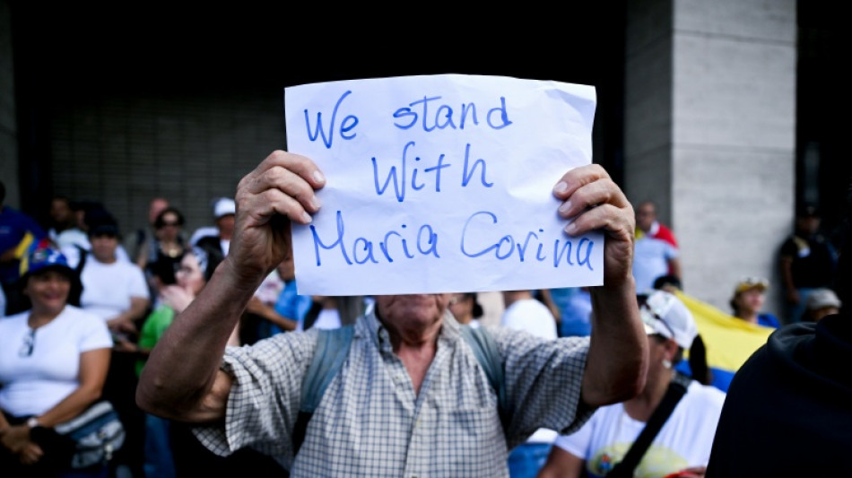 Hundreds protest for return of Nobel peace laureate Machado to Venezuela