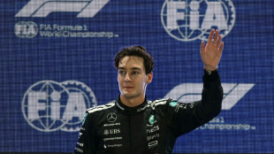 Russell takes pole position for Singapore Grand Prix as McLaren struggle