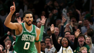 Tatum's 'emotional' return sparks Celtics over Mavs 
