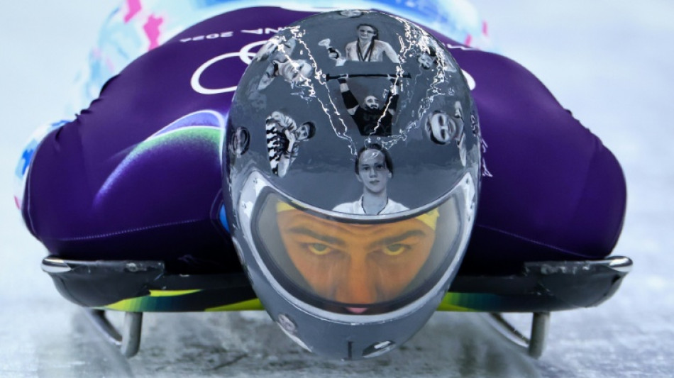 IOC allows Ukrainian athlete to wear black armband at Olympics for war dead
