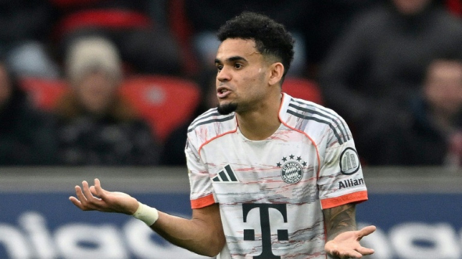 Nine-man Bayern hold on for draw at Leverkusen